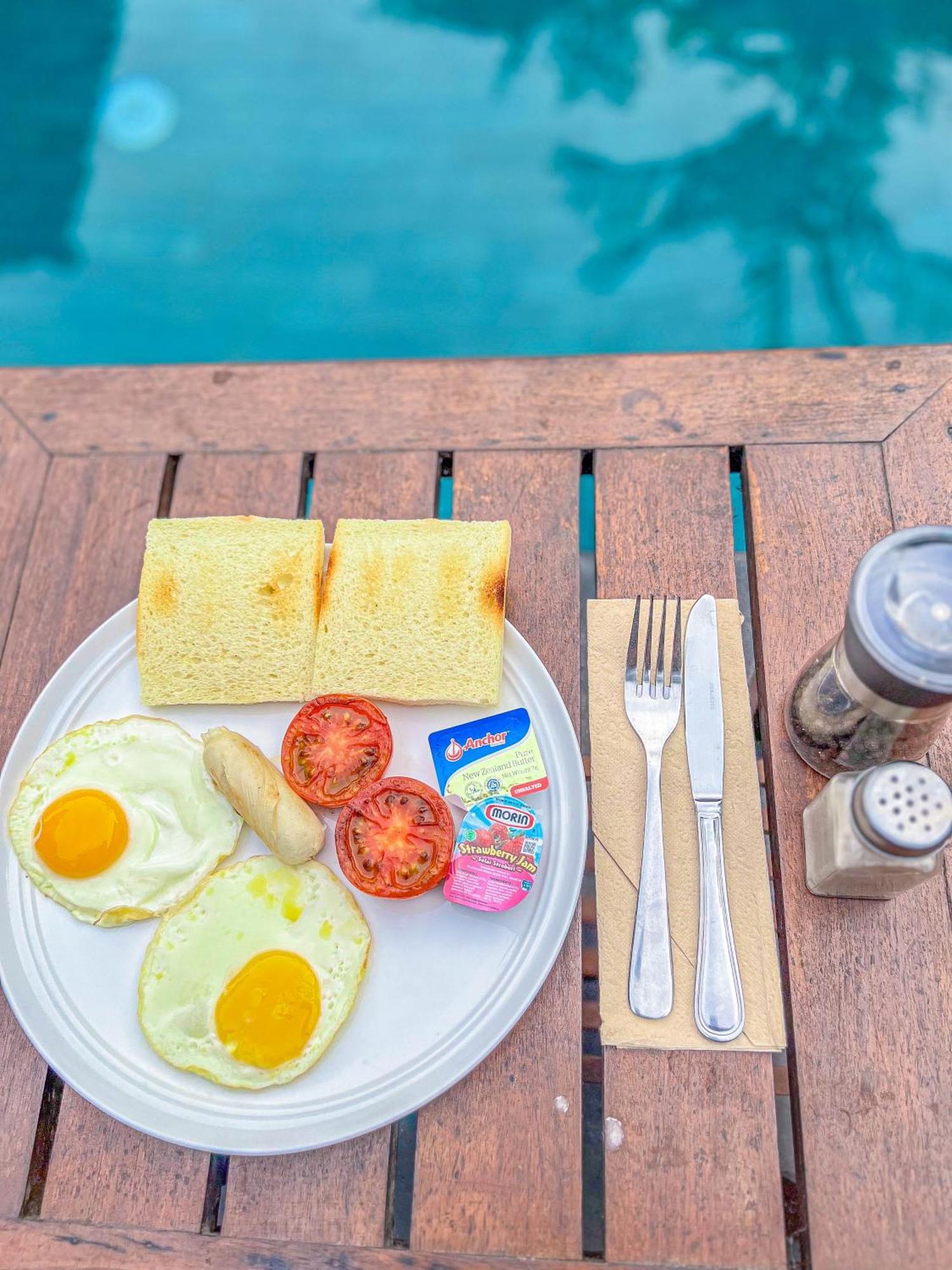 Puri Mango Guest House Sanur Bagian luar foto